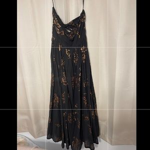 Black dress with gold accent. Free people strapless midi dress